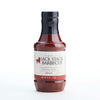 Bottle of Jack Stack Barbecue Spicy sauce on a white background