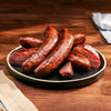 Platter of sausages on a wooden table