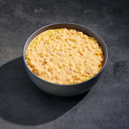Bowl of corn on a dark gray background