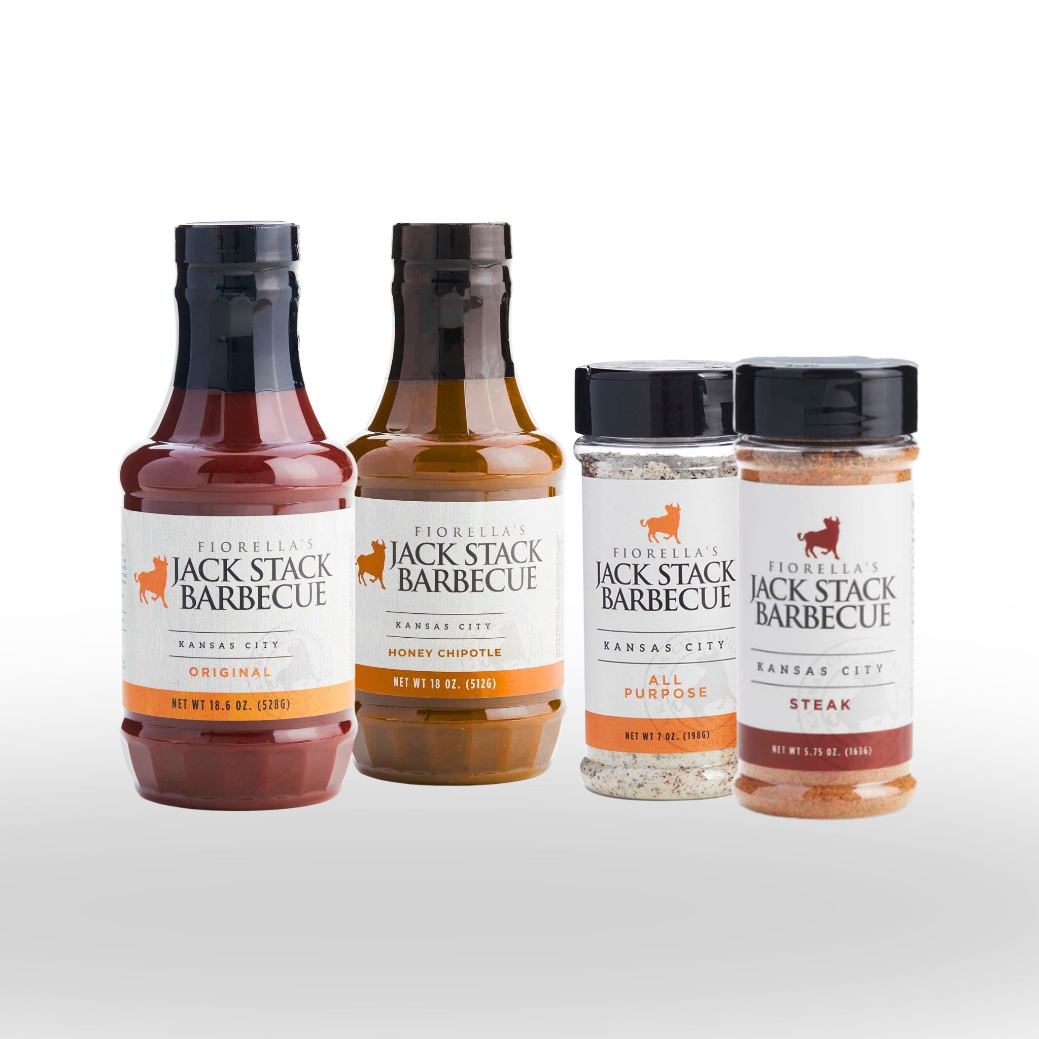Four bottles of Fiorella's Jack Stack Barbecue products on a white background