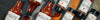 Alternate facing Jack Stack Barbecue sauces and rub jars.
